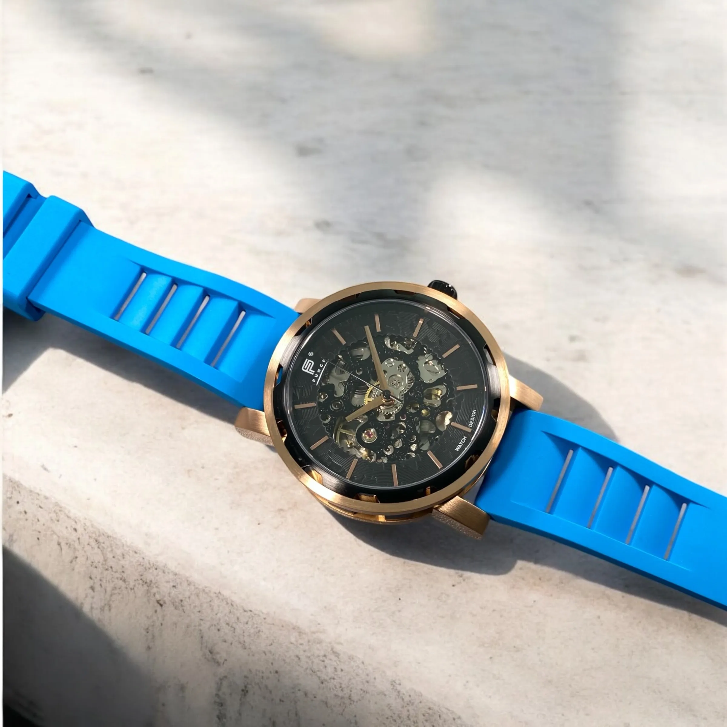 PUNCH Mens Watch, Rose Gold & Black Skeleton Automatic Watch - Blue Rubber Strap